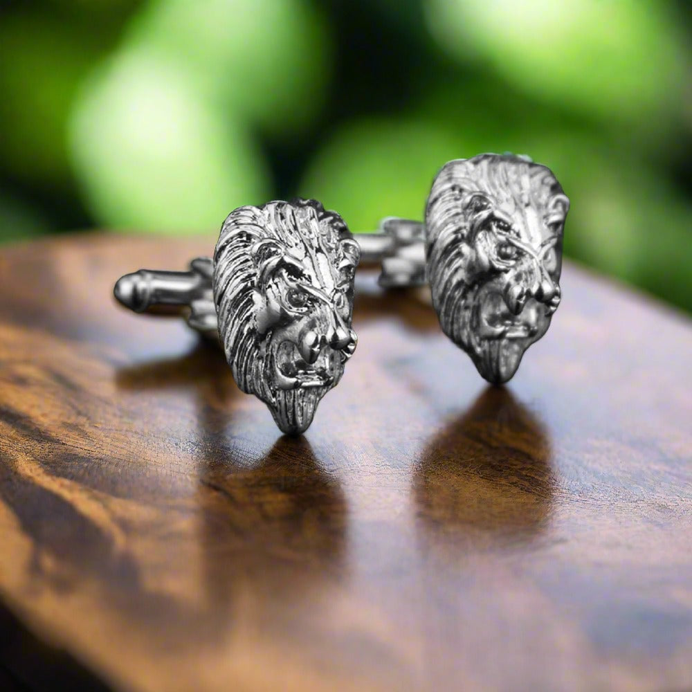 Front view of majestic lion head cufflinks, showcasing intricate design and chrome finish.