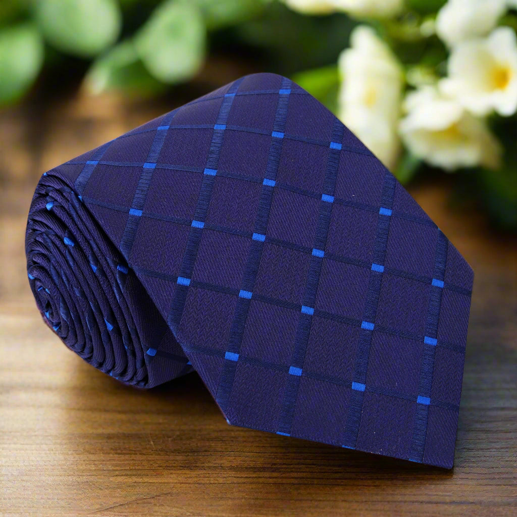 Elegant silk necktie with diamond texture in deep blue, ideal for weddings