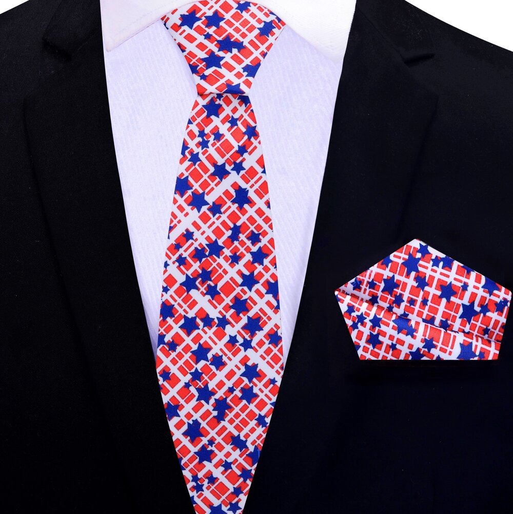Man wearing the American flag tie with a navy suit for a patriotic event