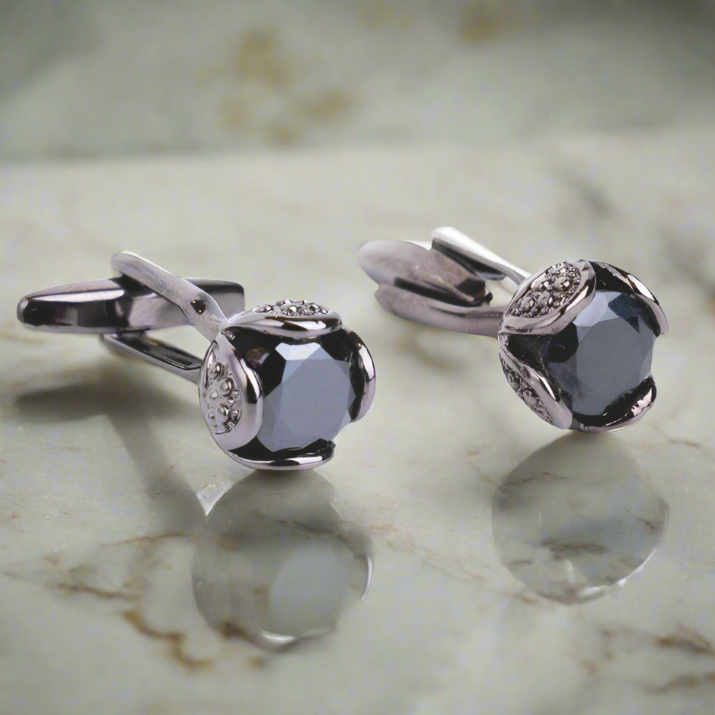 Stylish metal cufflinks featuring Dracula-inspired design for weddings