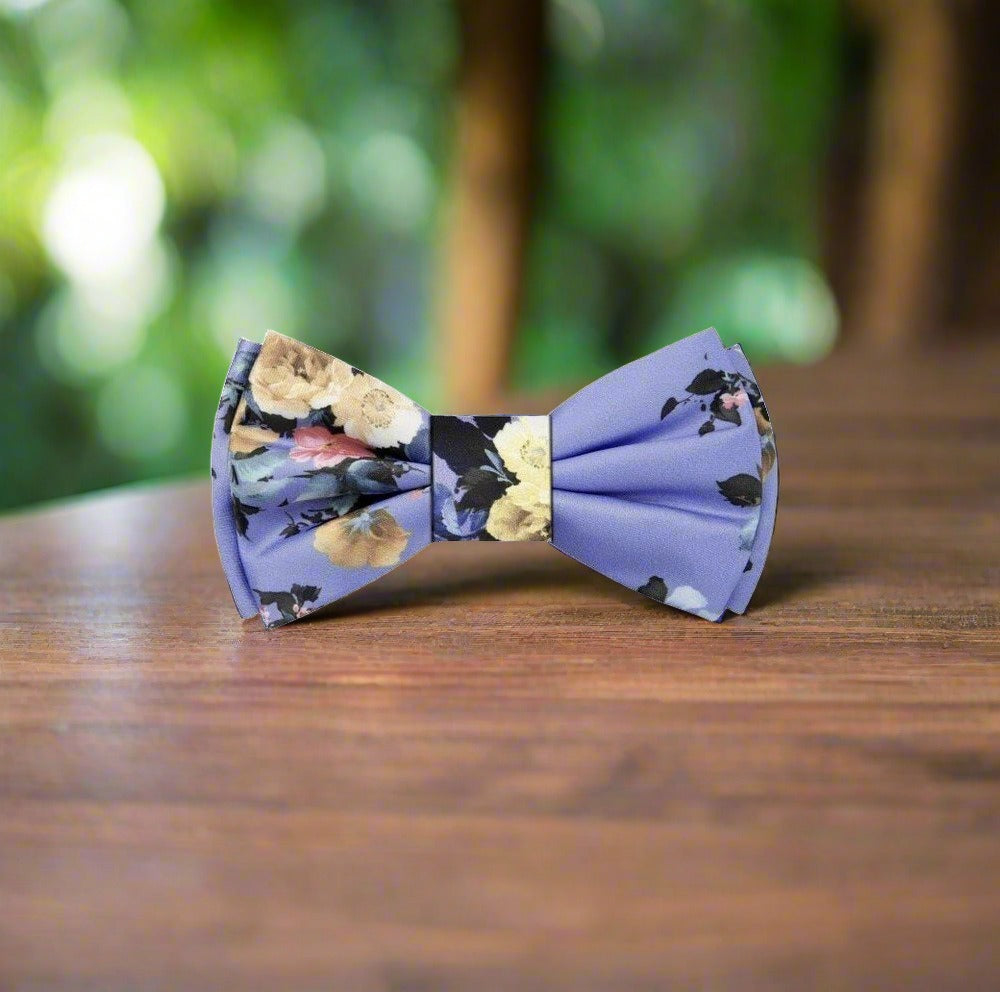 Artistic floral bow tie paired with a white shirt and navy suit for formal events