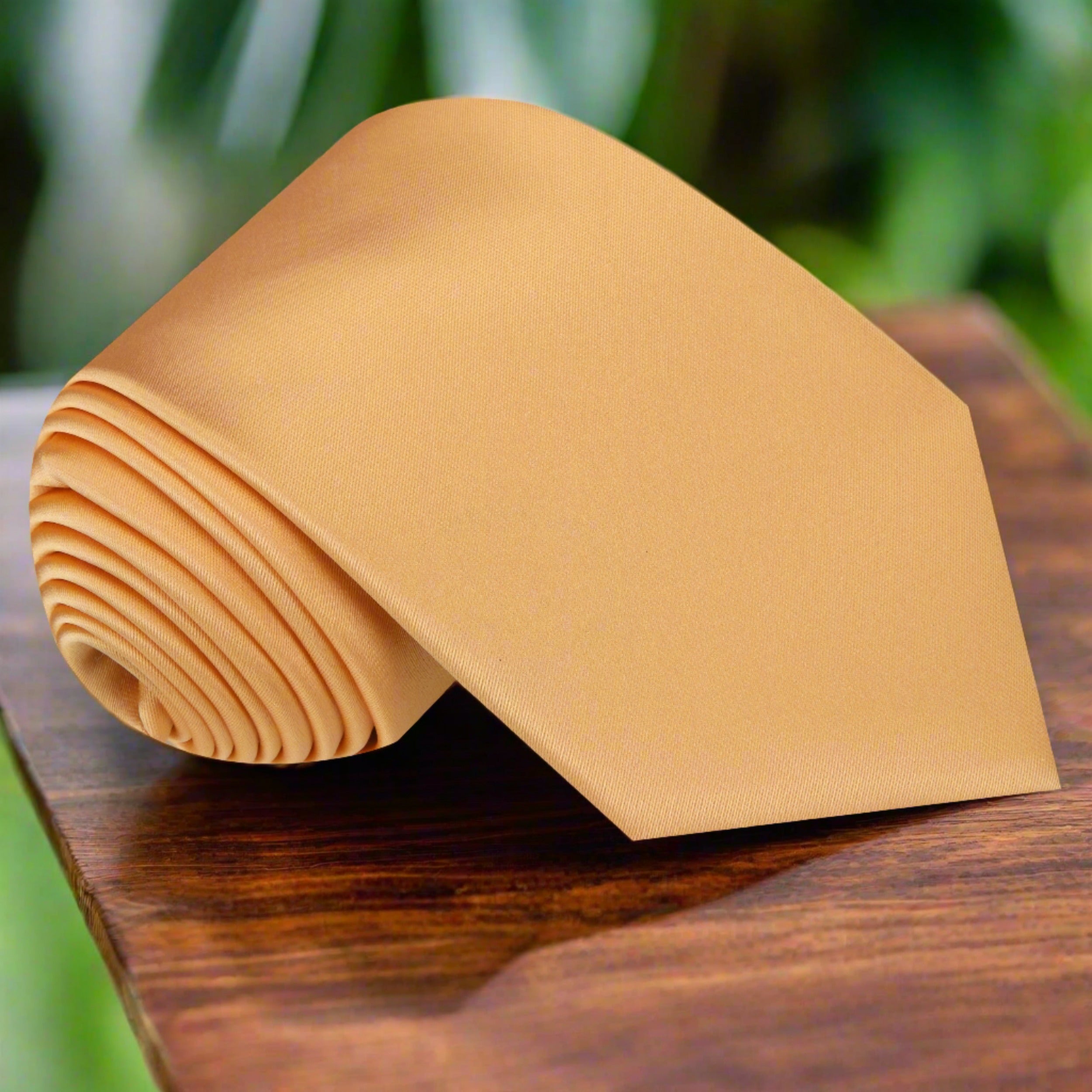 Radiant solid silk tie in soft marigold, perfect for formal events.