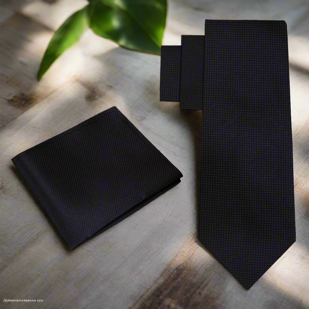 Elegant navy blue silk mens tie with subtle check pattern, suitable for weddings