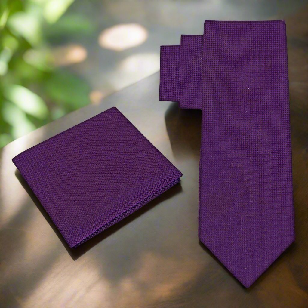 Elegant navy blue silk mens tie with subtle check pattern, suitable for weddings