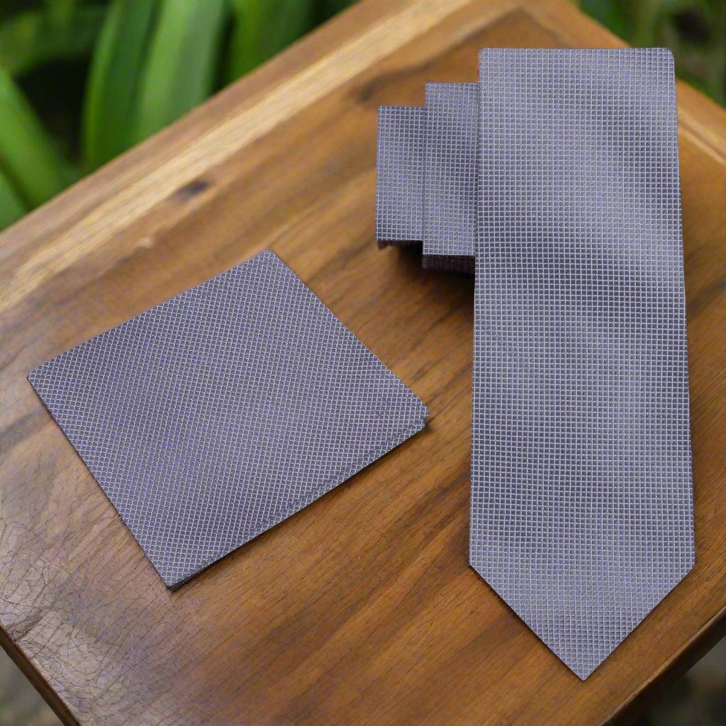 Matching pocket square in silk fabric for a coordinated formal look