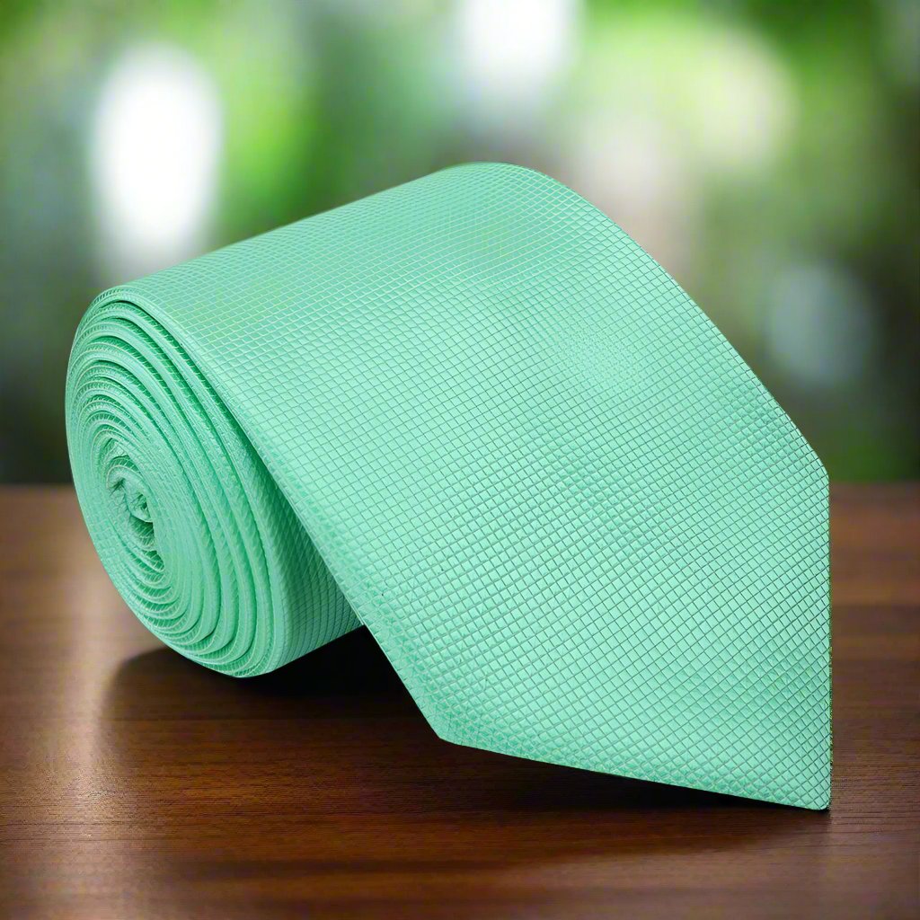 Matching pocket square in silk fabric for a coordinated formal look