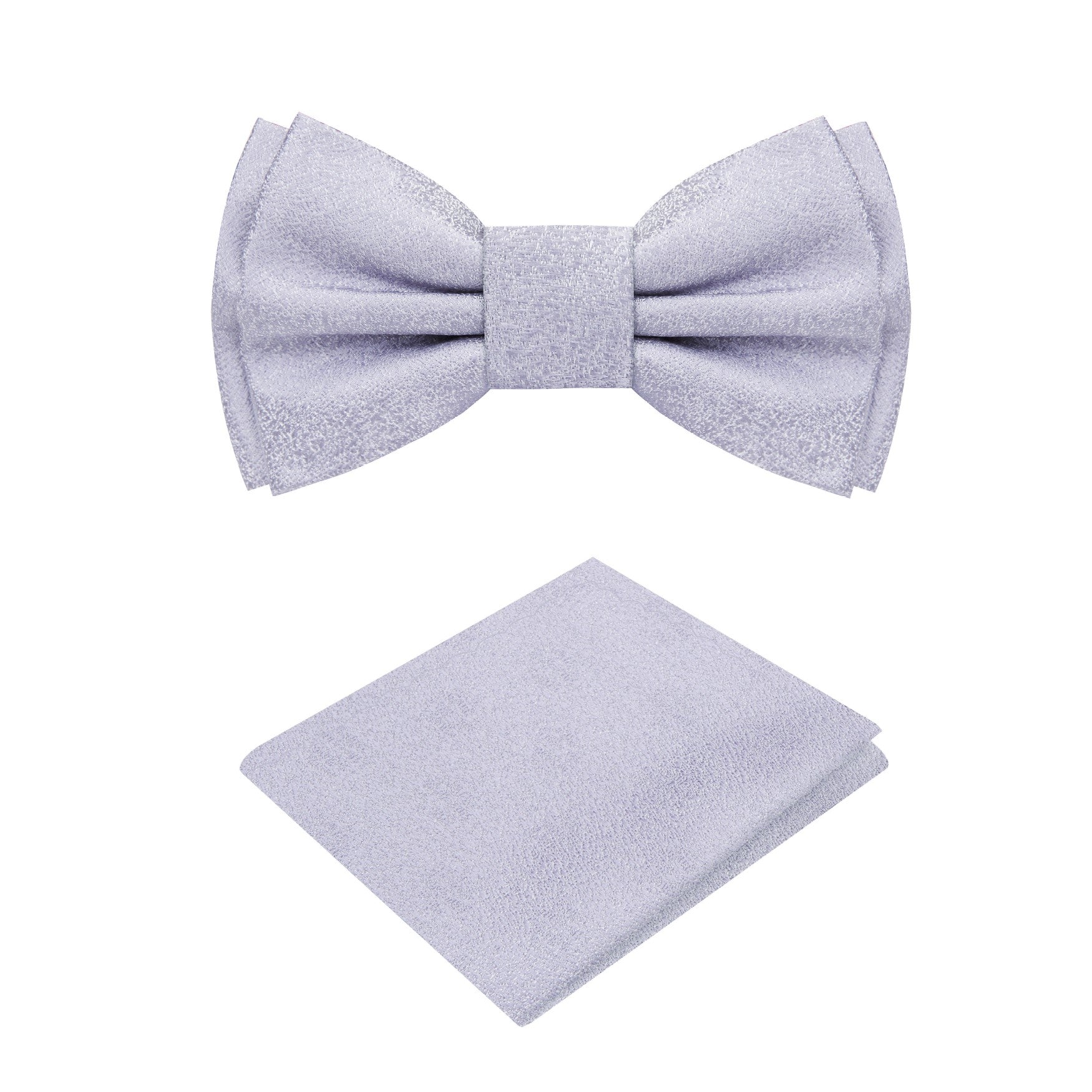 Close-up of a kids shimmer silver bow tie on a young boy's collar, highlighting the textured fabric and shimmer finish