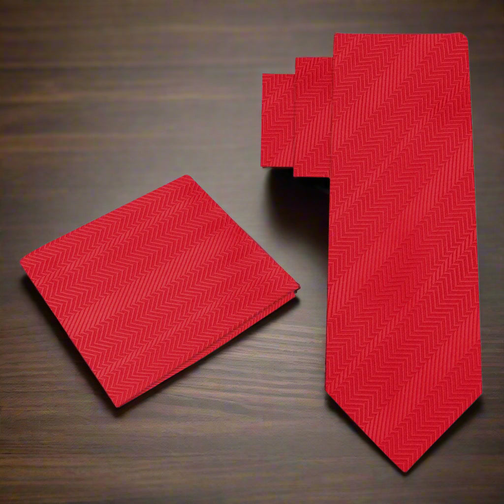 Elegant Garnet Red Silk Necktie displayed with a white dress shirt and charcoal grey suit.