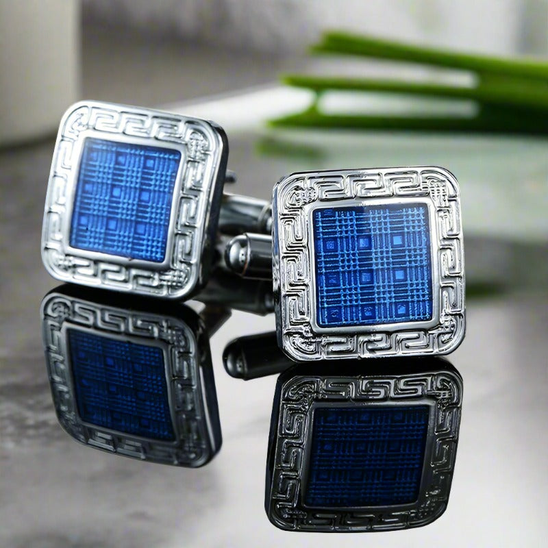 Close-up of blue gemstone cufflinks in square shape on a formal shirt