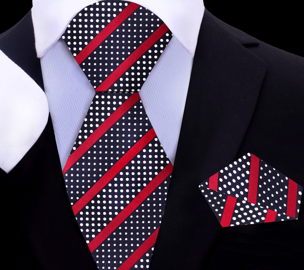 Close-up of black and burgundy kids tie set with pocket square styled on dress shirt