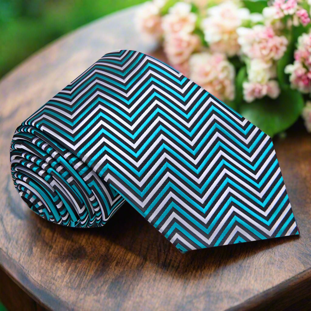 Teal razorback necktie displayed on a white dress shirt, showcasing its vibrant colors and modern design.