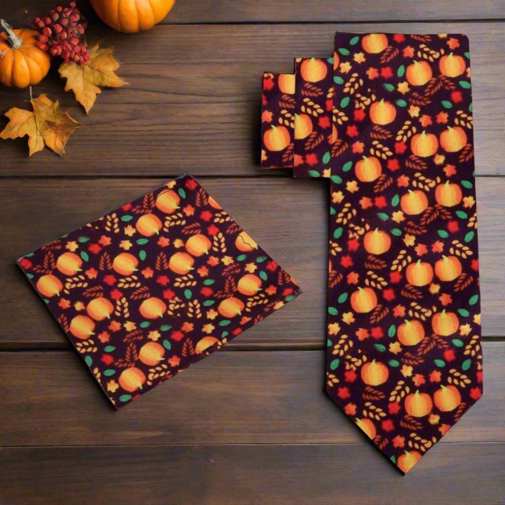 Autumn themed silk tie featuring pumpkins and colorful leaves, ideal for Thanksgiving.