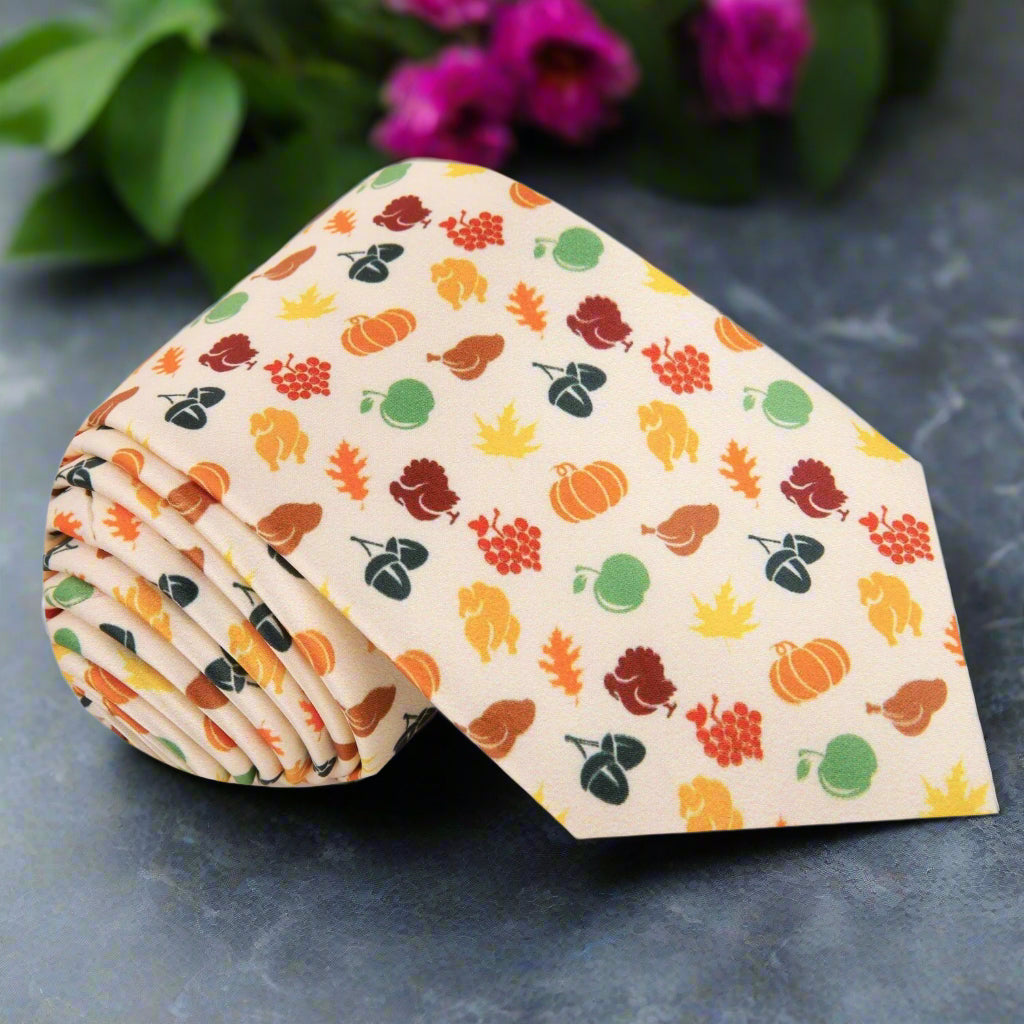 Front view of the Thanksgiving Celebration necktie with colorful turkey and pumpkin designs.