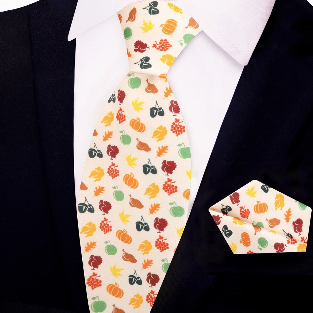 Thanksgiving Celebration necktie styled with a light brown dress shirt and dark brown suit.