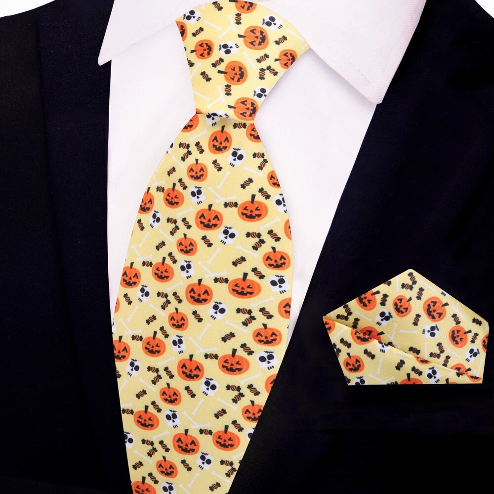 Close-up of Halloween jack-o-lantern themed necktie with vibrant orange and black pattern