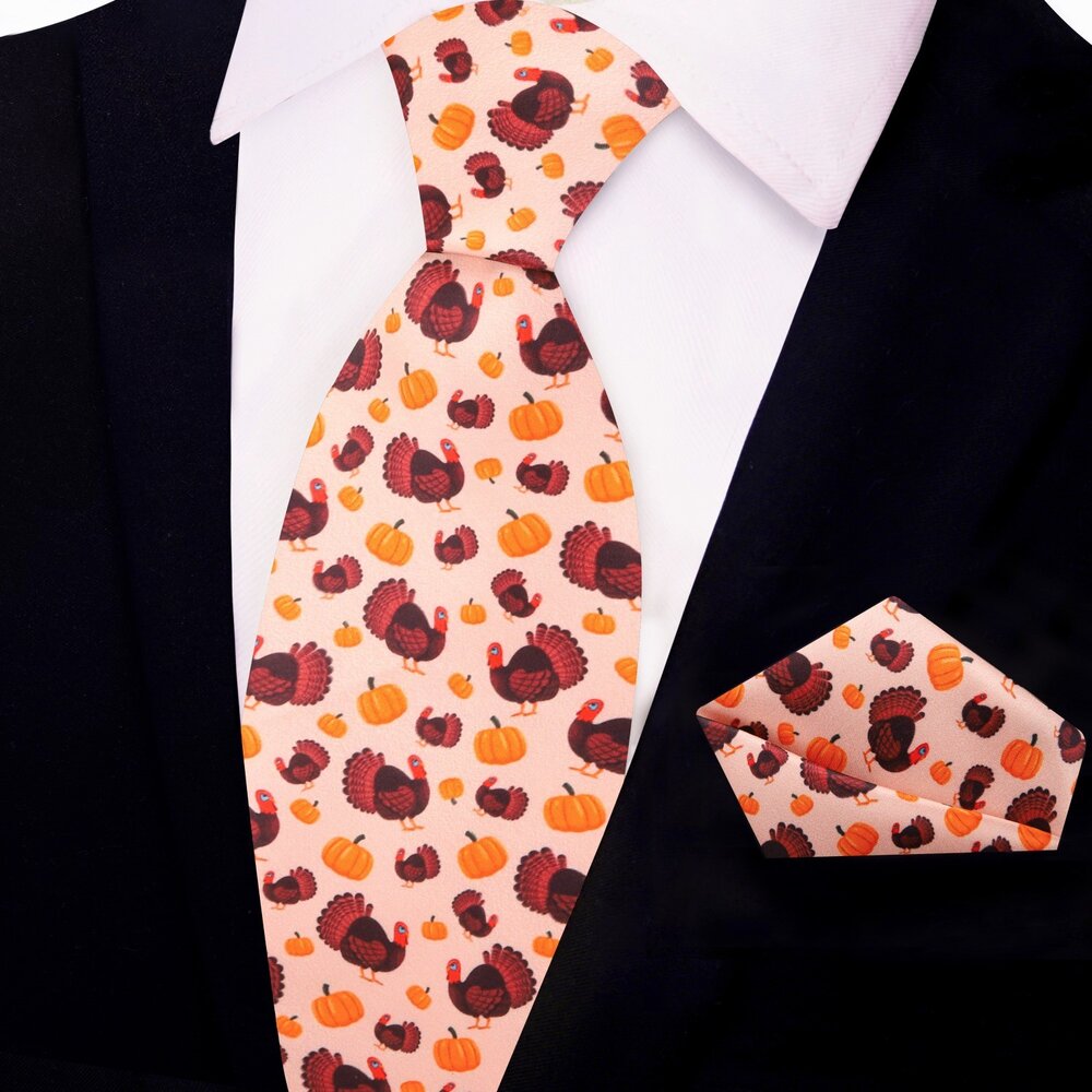 Close-up of the festive turkey necktie showcasing the vibrant turkeys and pumpkins design.