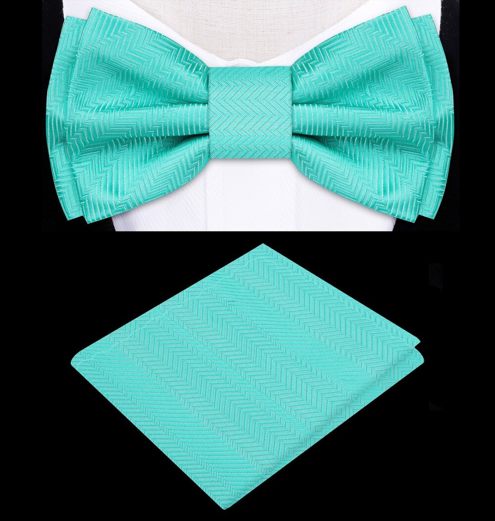 Close-up of kids turquoise bow tie with lined texture