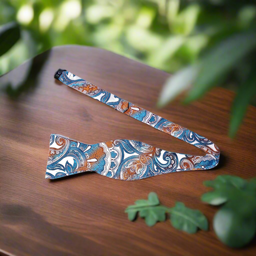Front view of the silk paisley self tie bow tie with pocket square for formal wear
