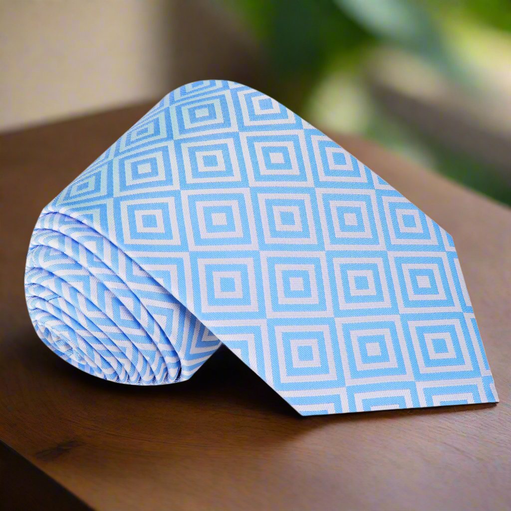 Front view of a geometric silk necktie in light blue and white for weddings