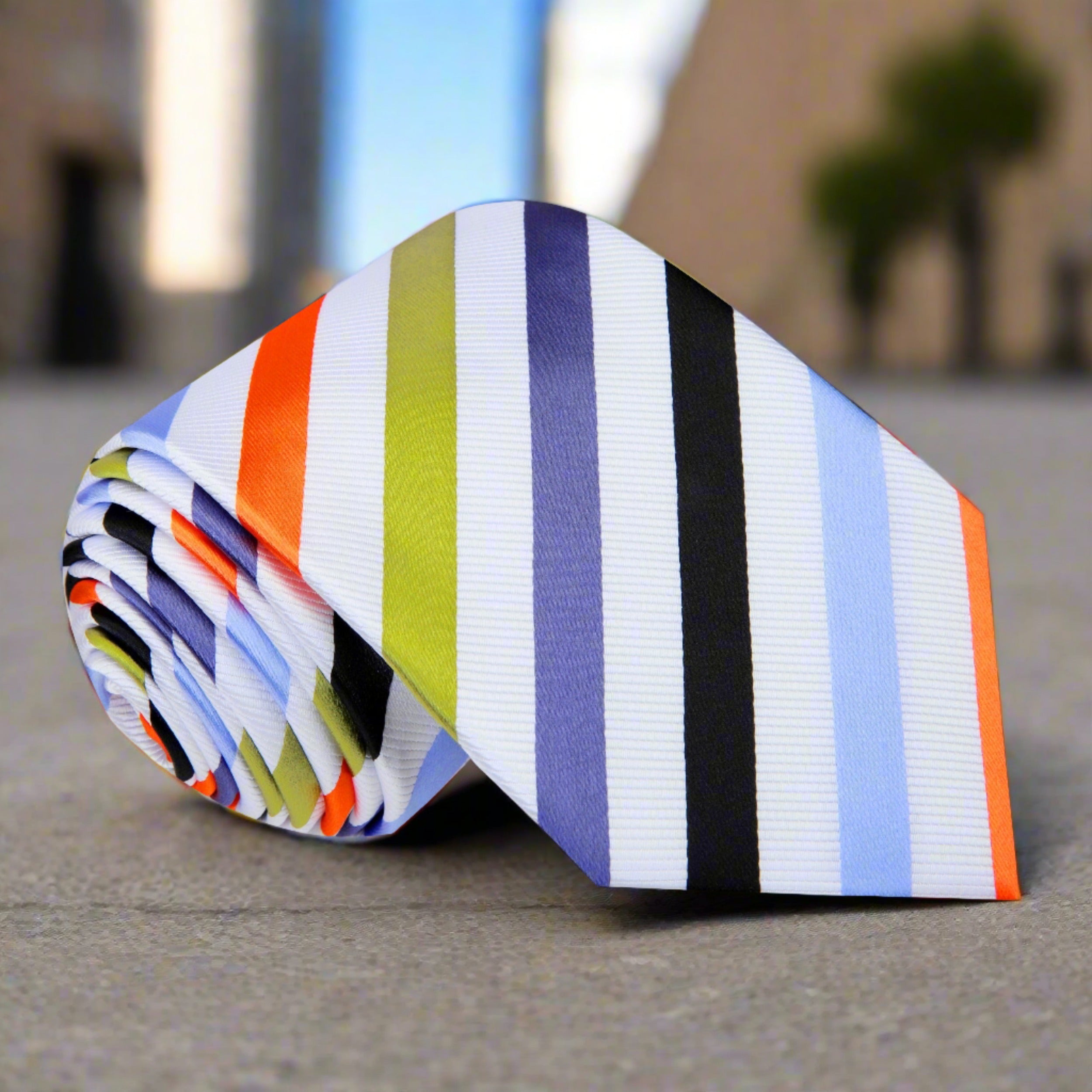 Close-up of men's silk striped tie with vibrant colors for formal events
