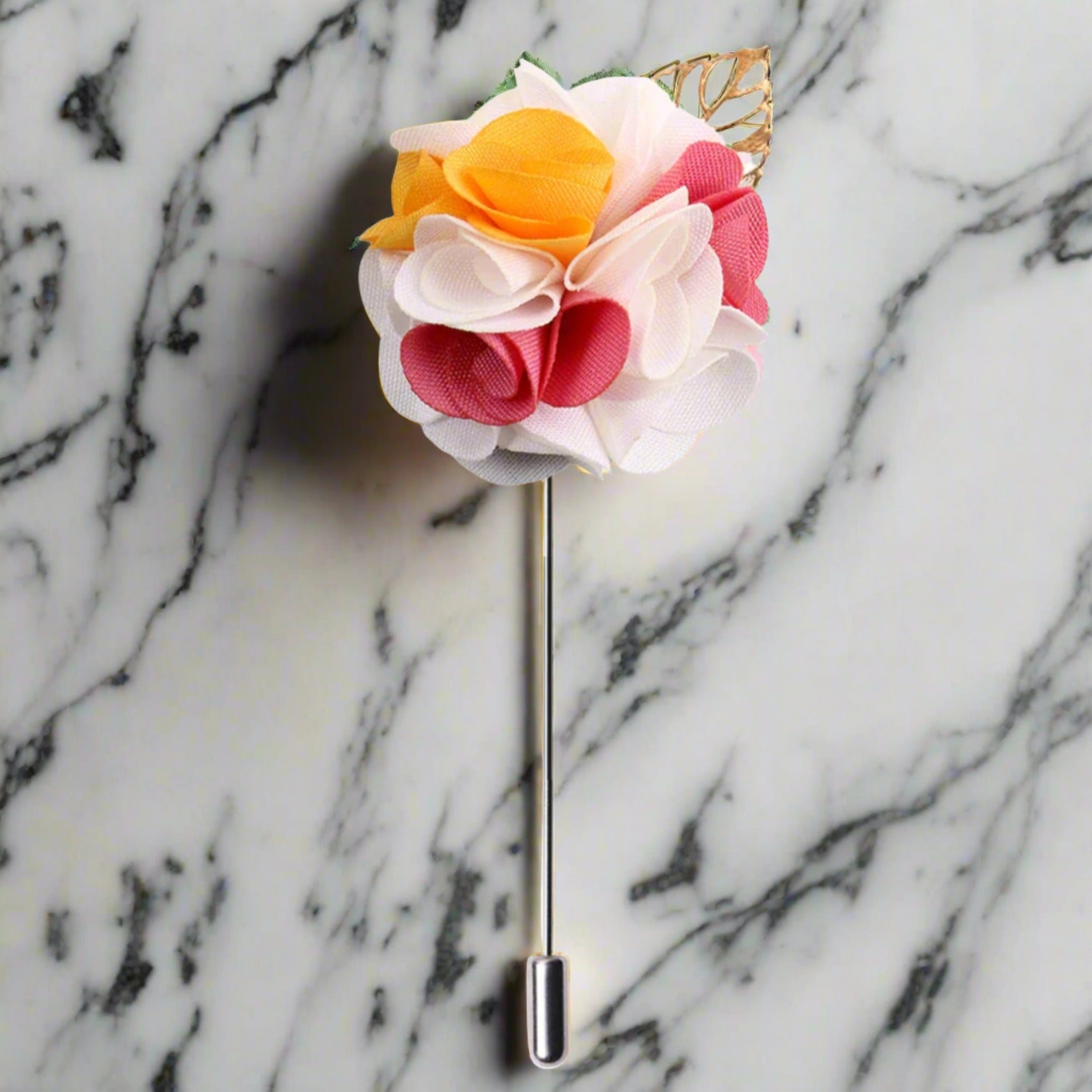 Stylish green flower lapel pin worn on a suit for a formal event.