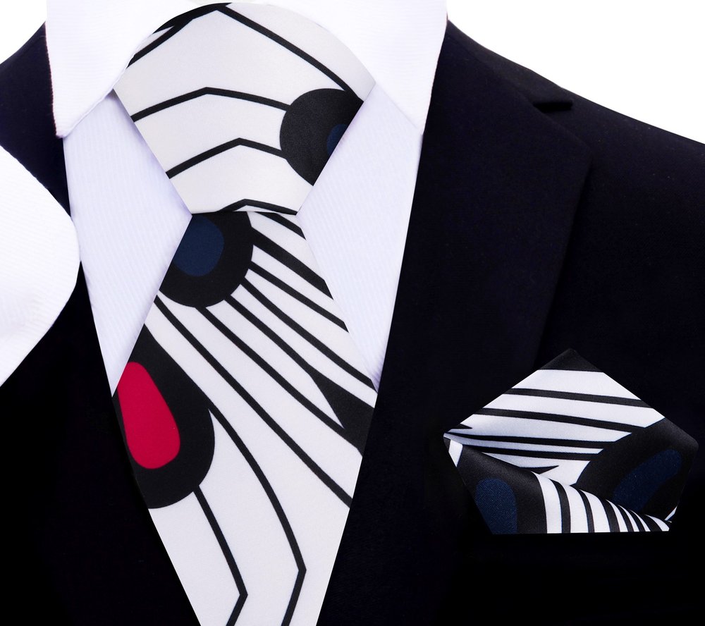 Model wearing the elegant paisley necktie with a navy suit, perfect for corporate presentations.