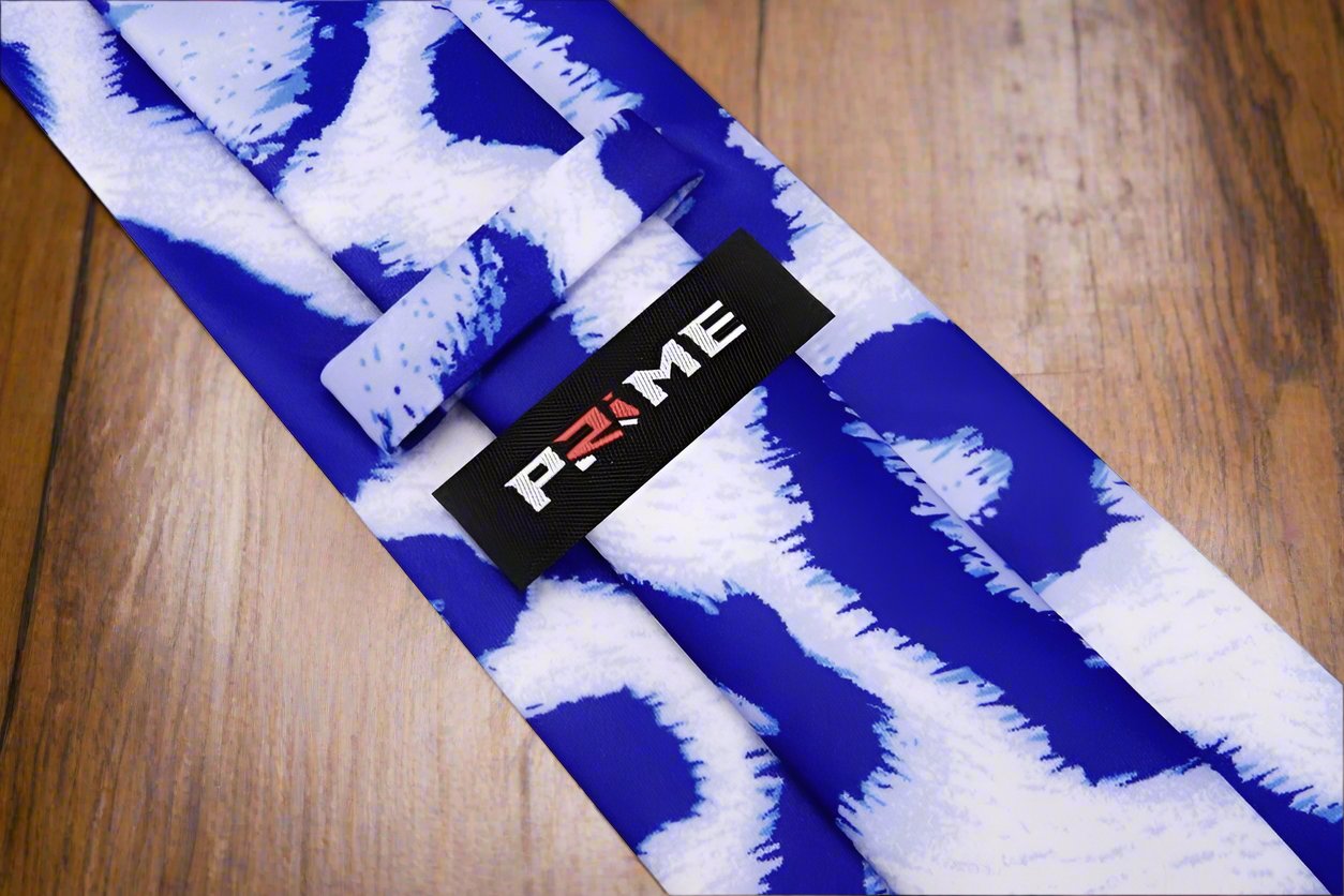 Frostwyke mens tie styled with navy suit and crisp white shirt for formal event
