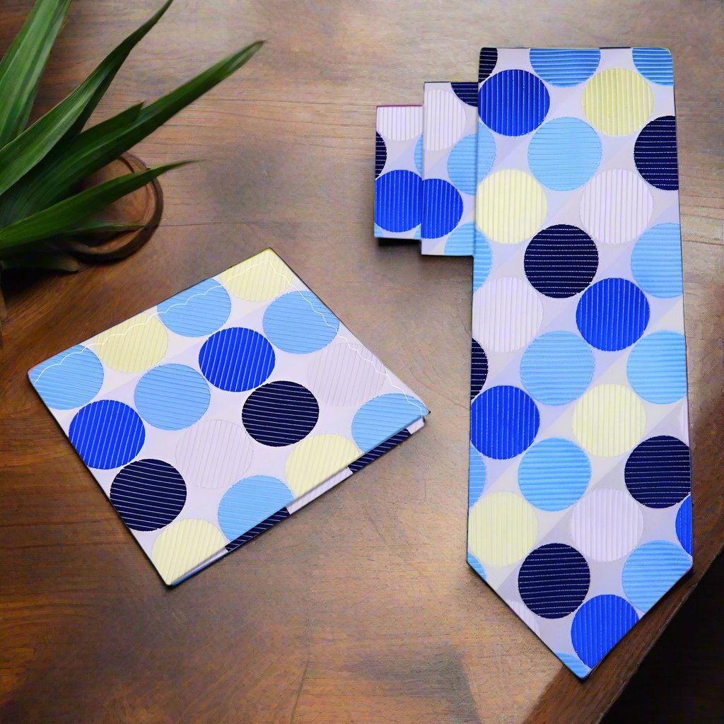 Large polka dot silk necktie in vibrant colors, showcasing the bold pattern against a white shirt.