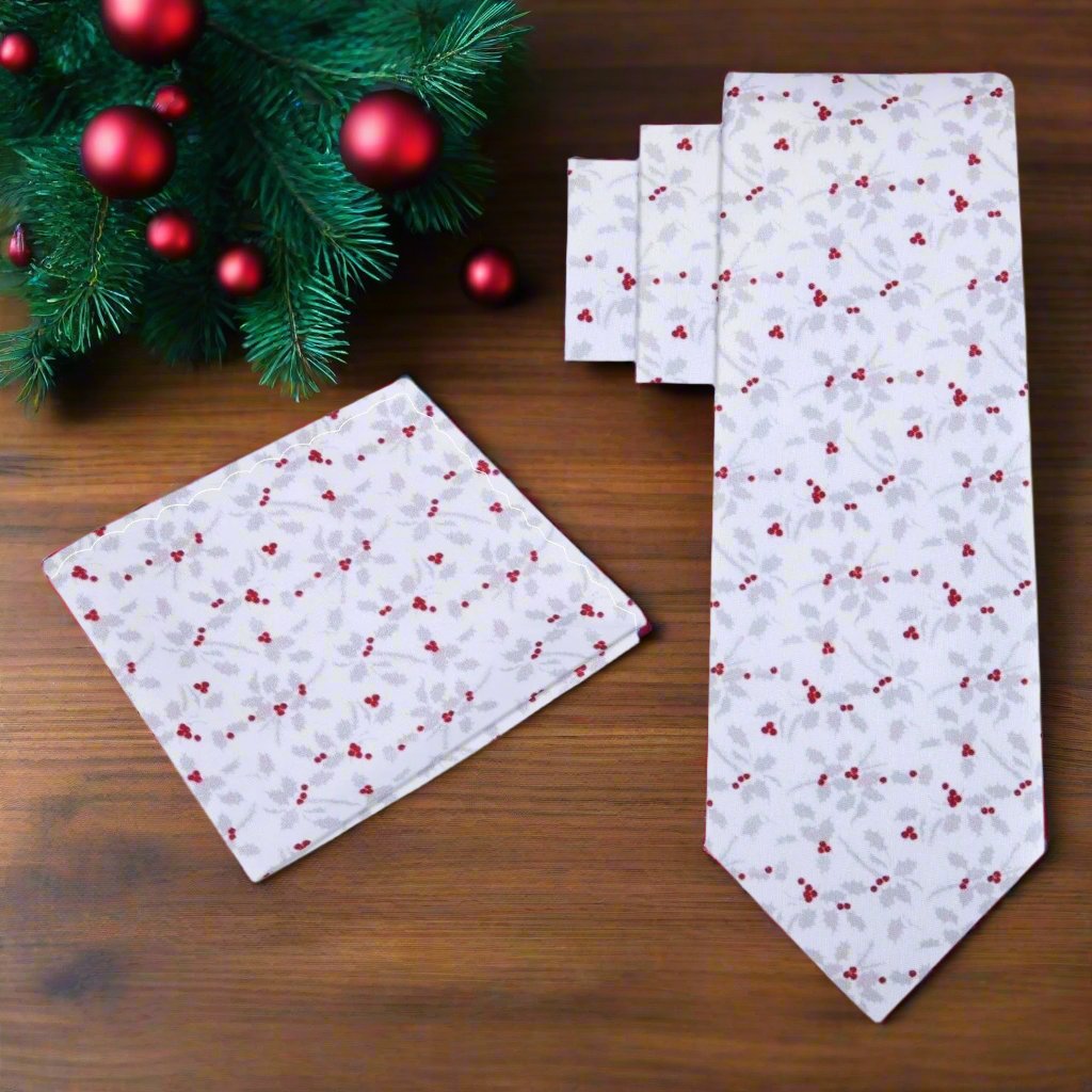 Folded festive necktie with a pocket square, highlighting the vibrant colors.