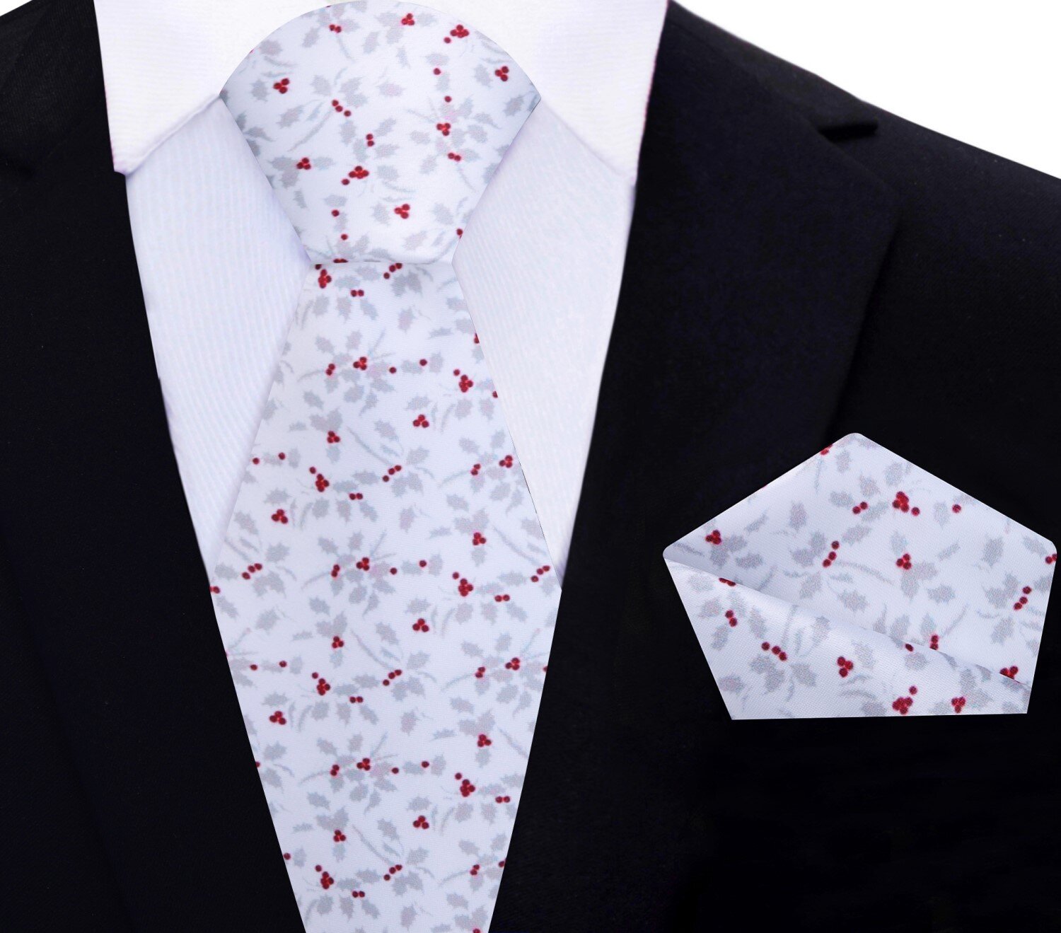 Folded festive necktie with a pocket square, highlighting the vibrant colors.