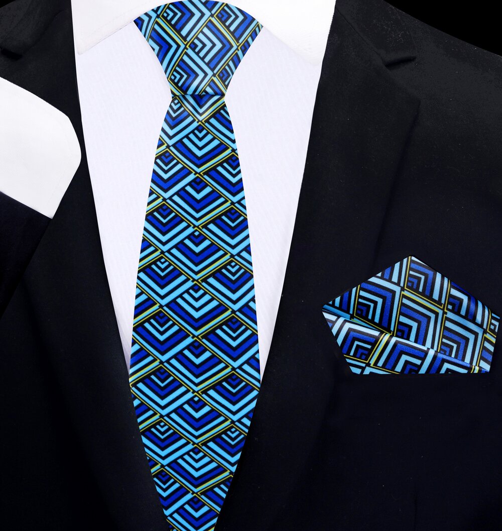 Nautilus silk tie paired with a white shirt and navy suit, suitable for business events.