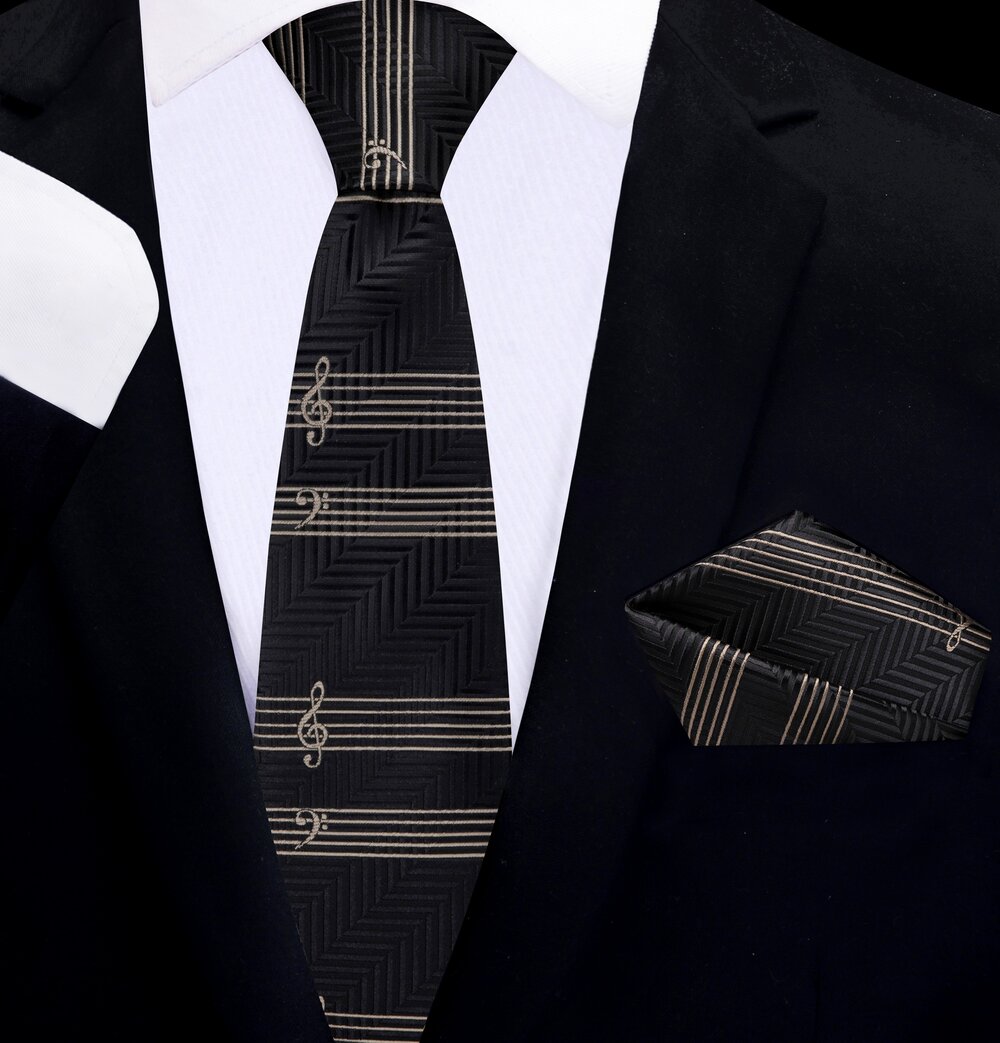 Elegant display of the Melodic Harmony Music Necktie in a stylish tan suit.