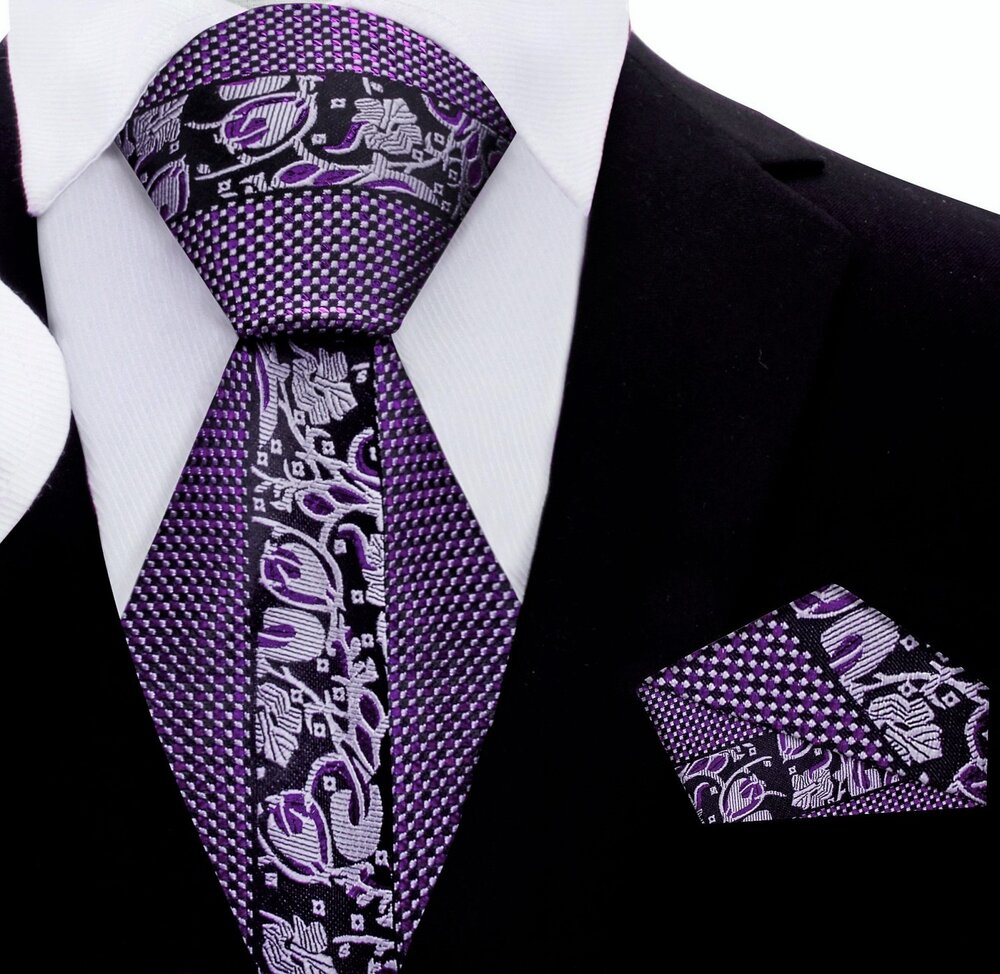 Close-up of designer floral necktie with metallic purple and checkered border for formal occasions