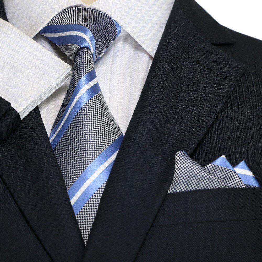 Dapper stripe silk necktie for kids displayed on a formal outfit, showcasing its elegant design.