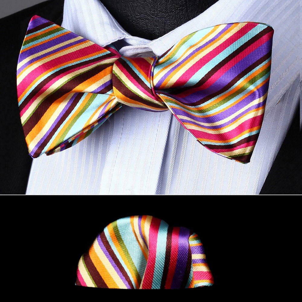 Close-up of dark yellow stripe silk bow tie with intricate pattern