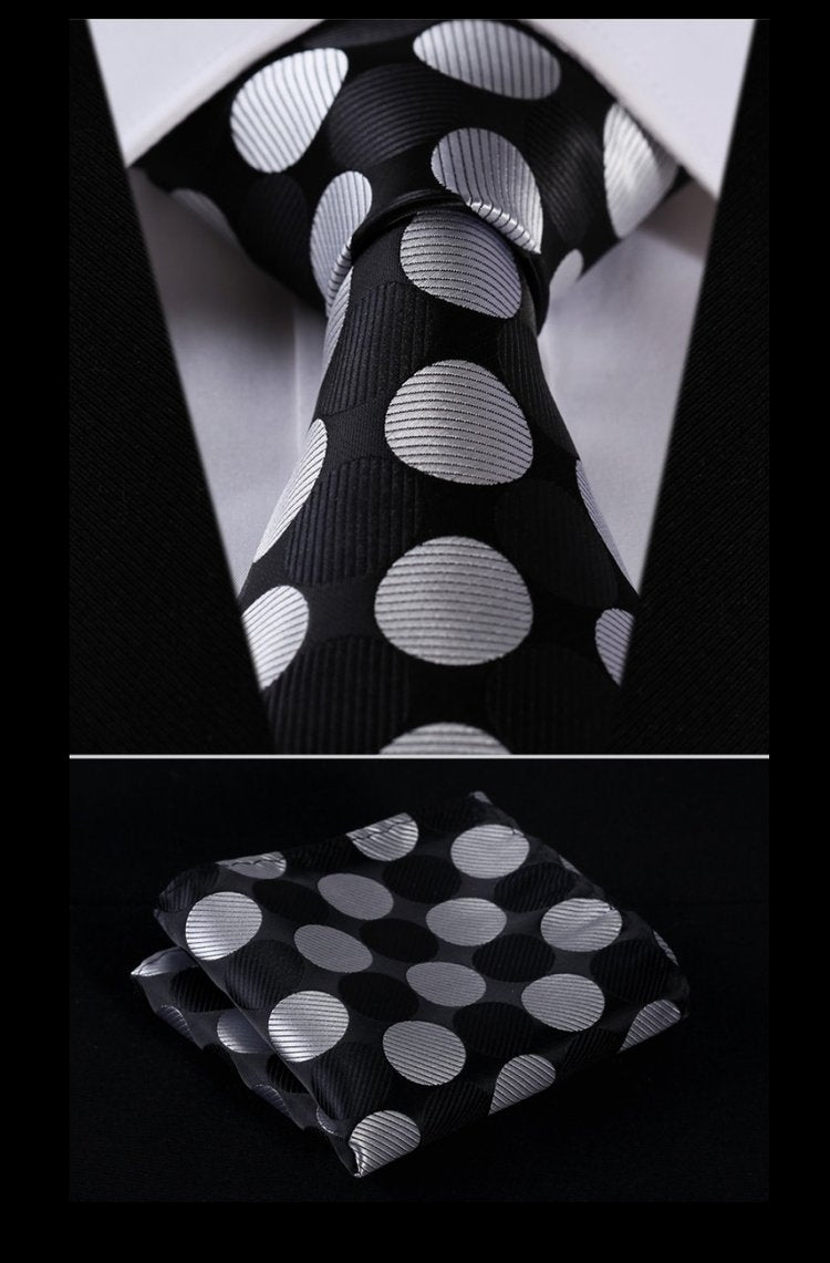 Close-up of the polka dot tie and silk pocket square set for kids, showcasing the fabric texture and design.