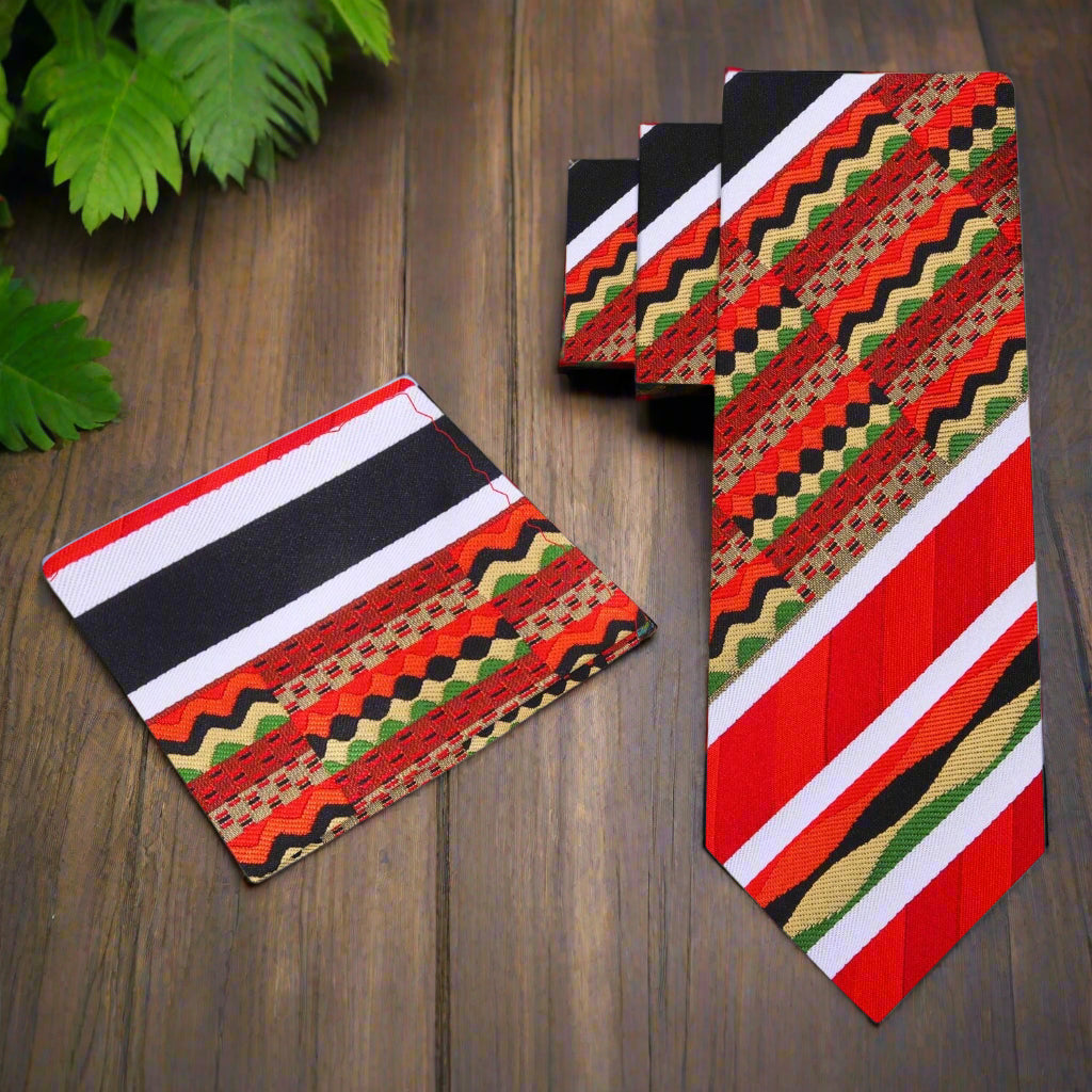 Close-up of silk necktie with vibrant Kente pattern and matching pocket square